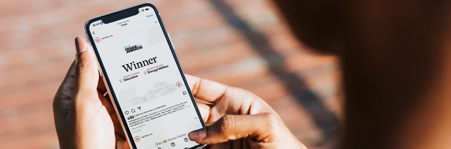 Acquia Engage Award on a phone screen