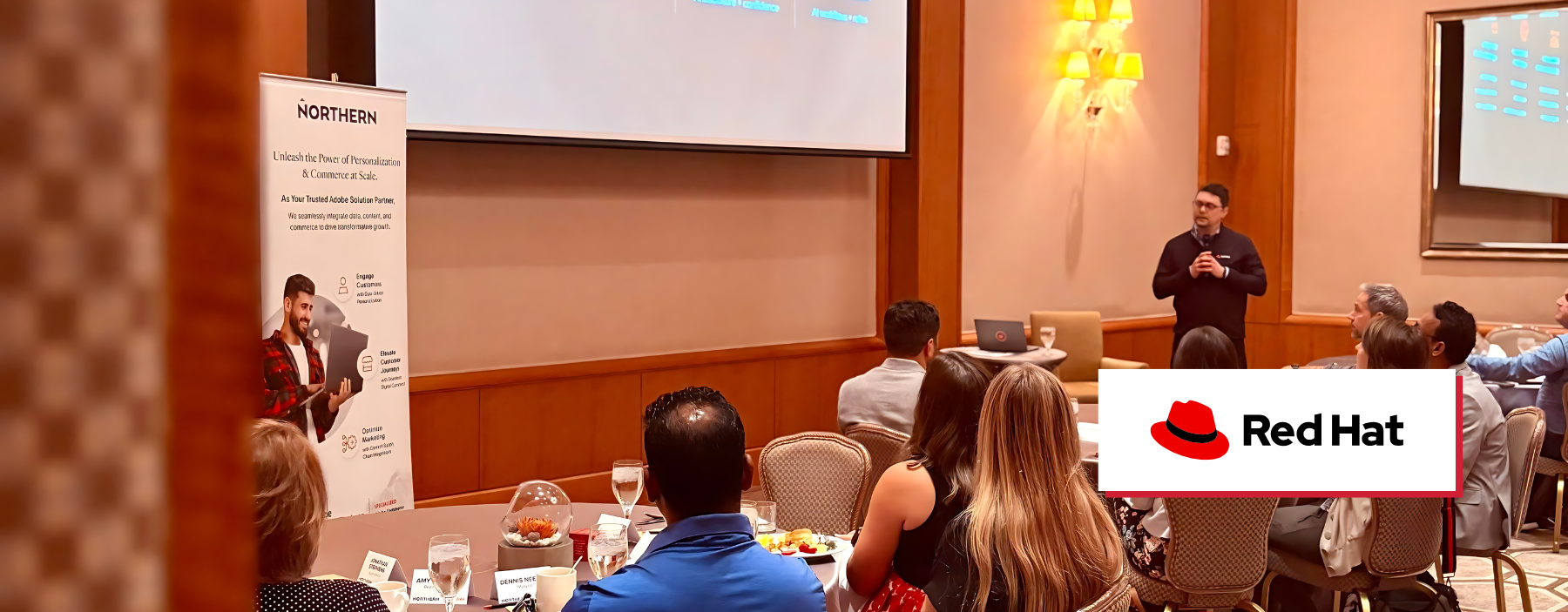 Rob Chappell speaking in front of a crowd at CX Café in Raleigh, NC.