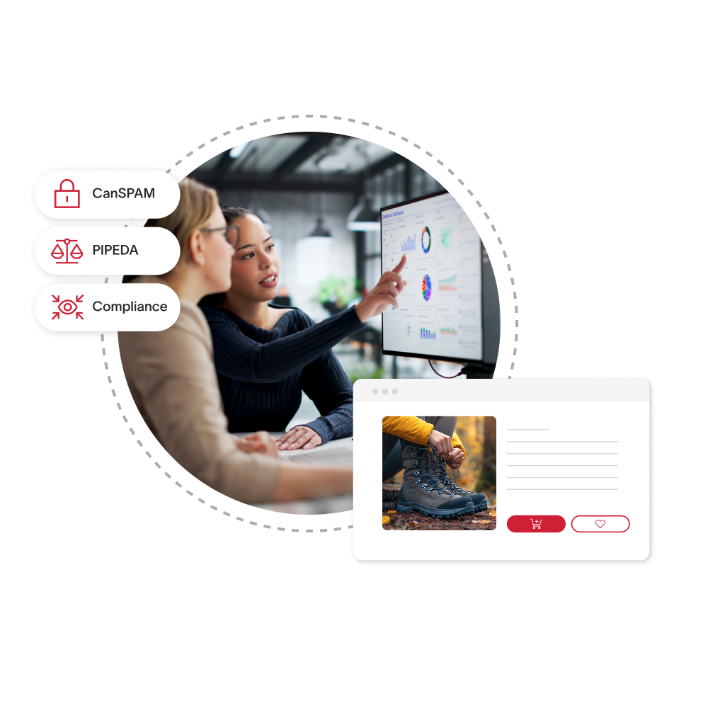 Two women looking at a compliance dashboard on a monitor.