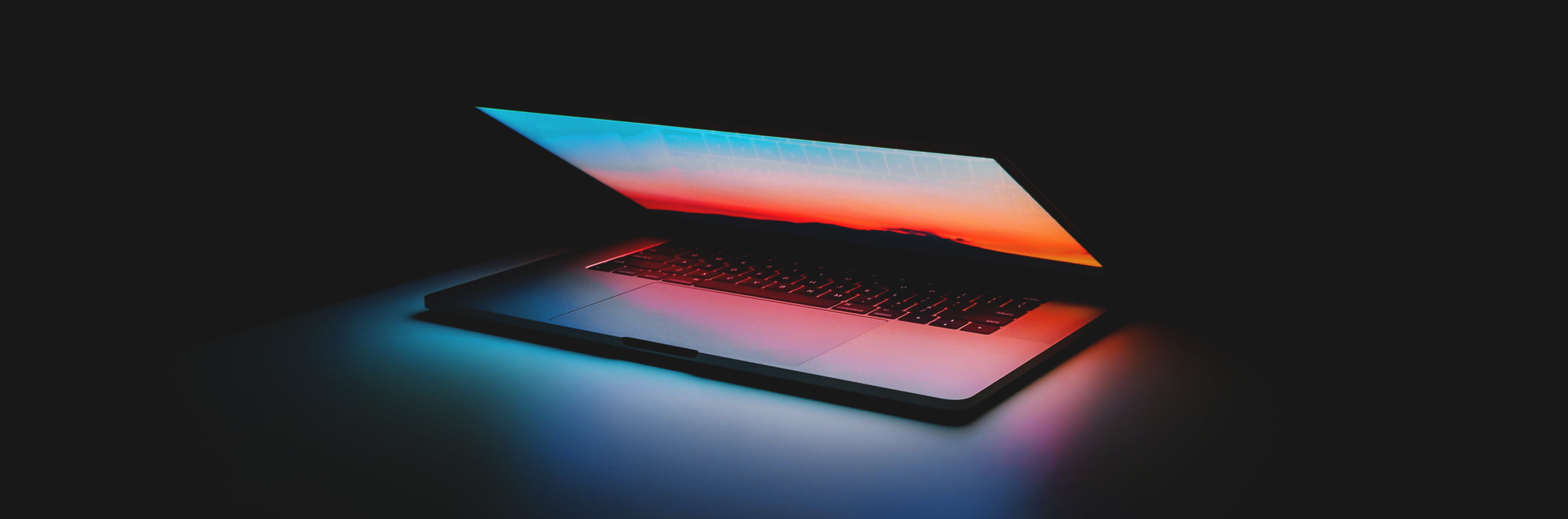 Laptop glowing in the dark