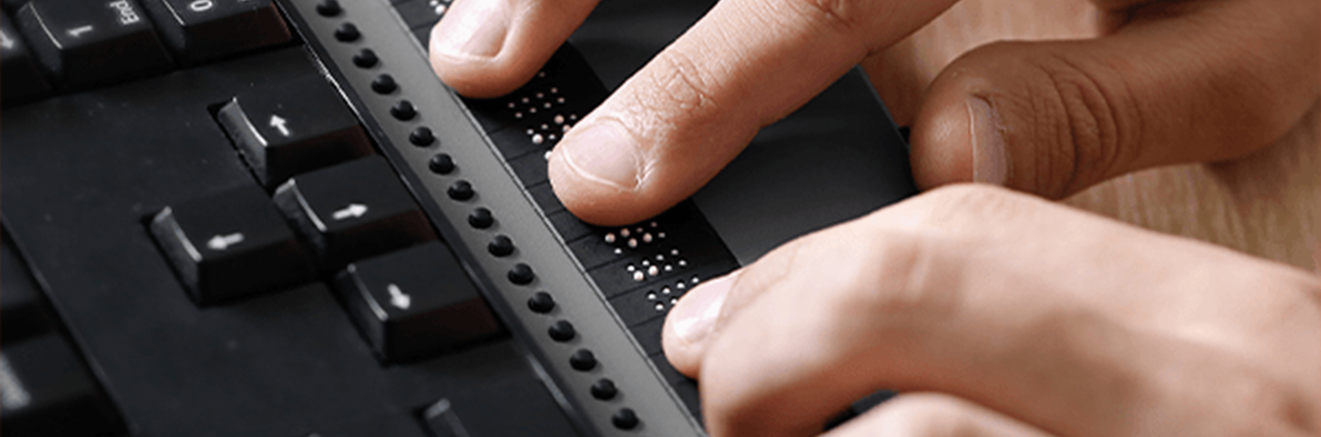 Hands typing on keyboard