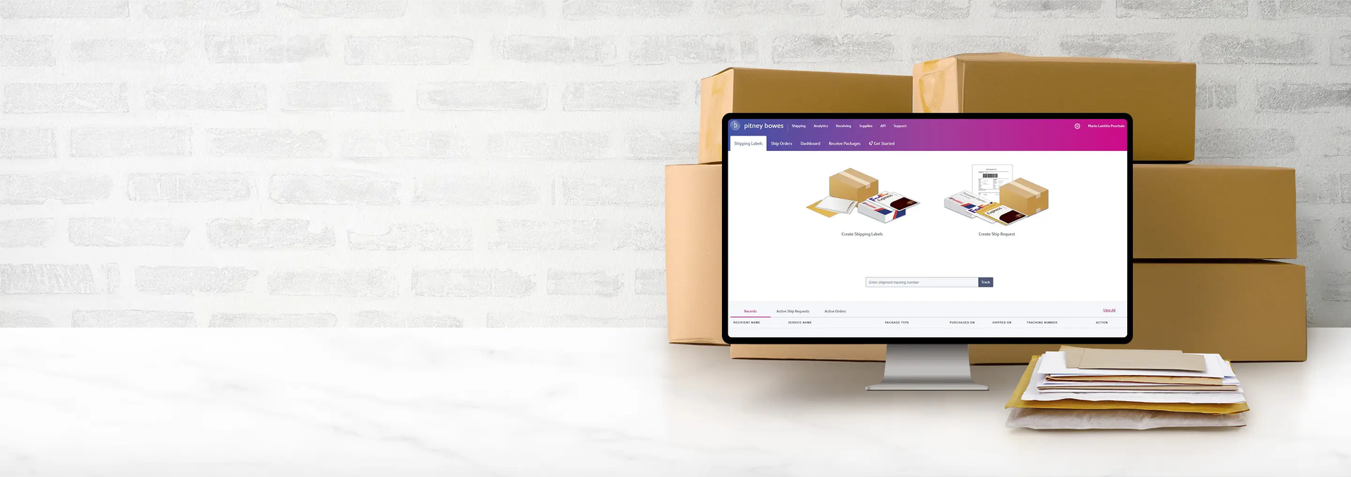 Transforming a Legacy: From Mailing Equipment Manufacturer to Global SaaS Shipping Leader A monitor displaying Pitney Bowes app.