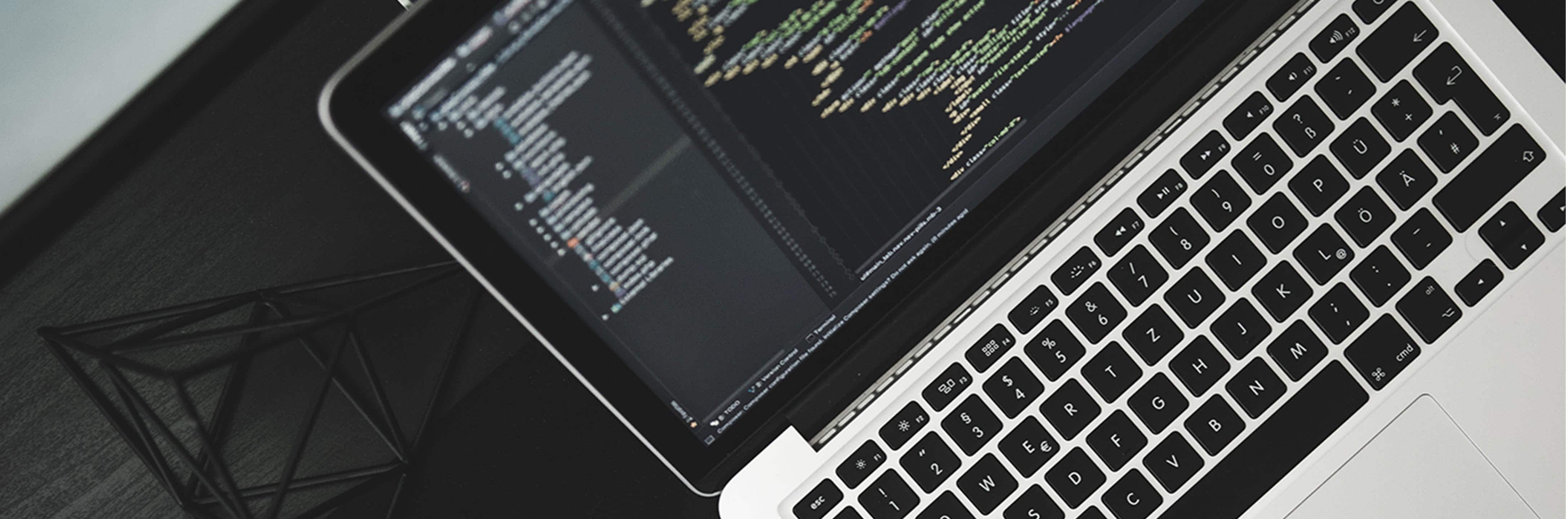 Computer showing development code