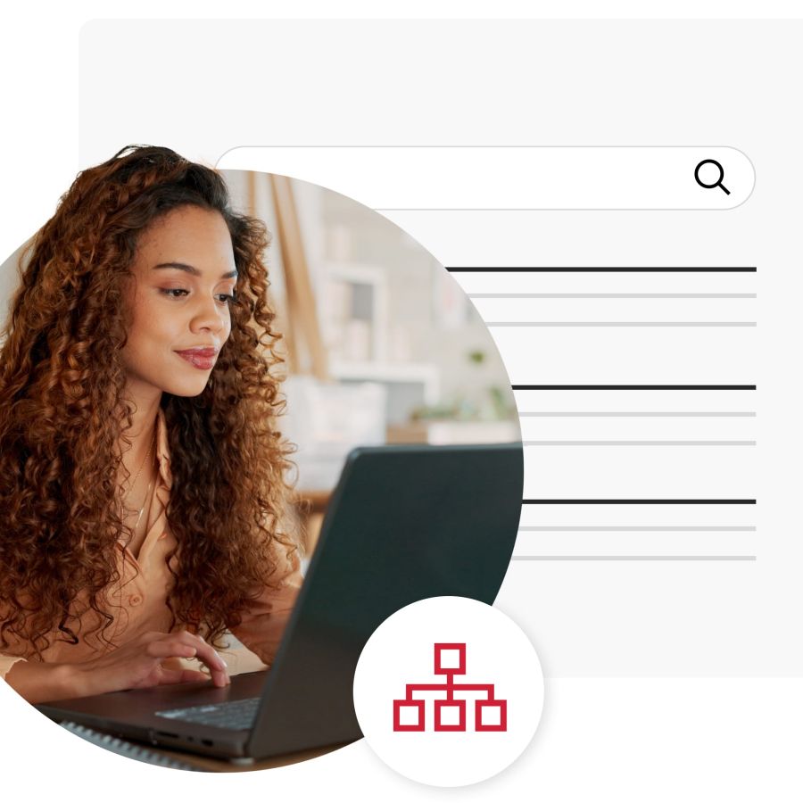 Woman with curly hair looking at her laptop 