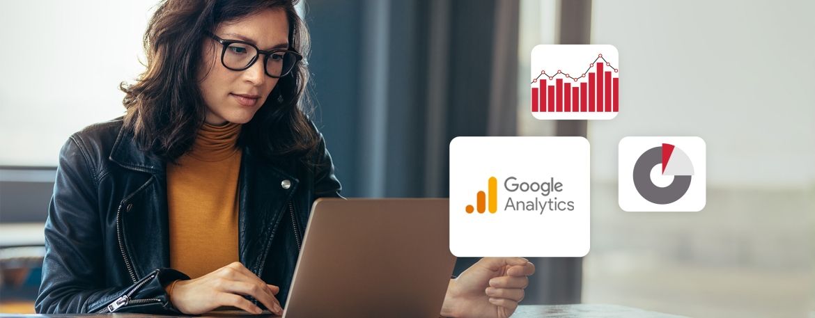 Lady working on a laptop and a bunch of pictures of statistical graphs with one of them being a google analytics logo
