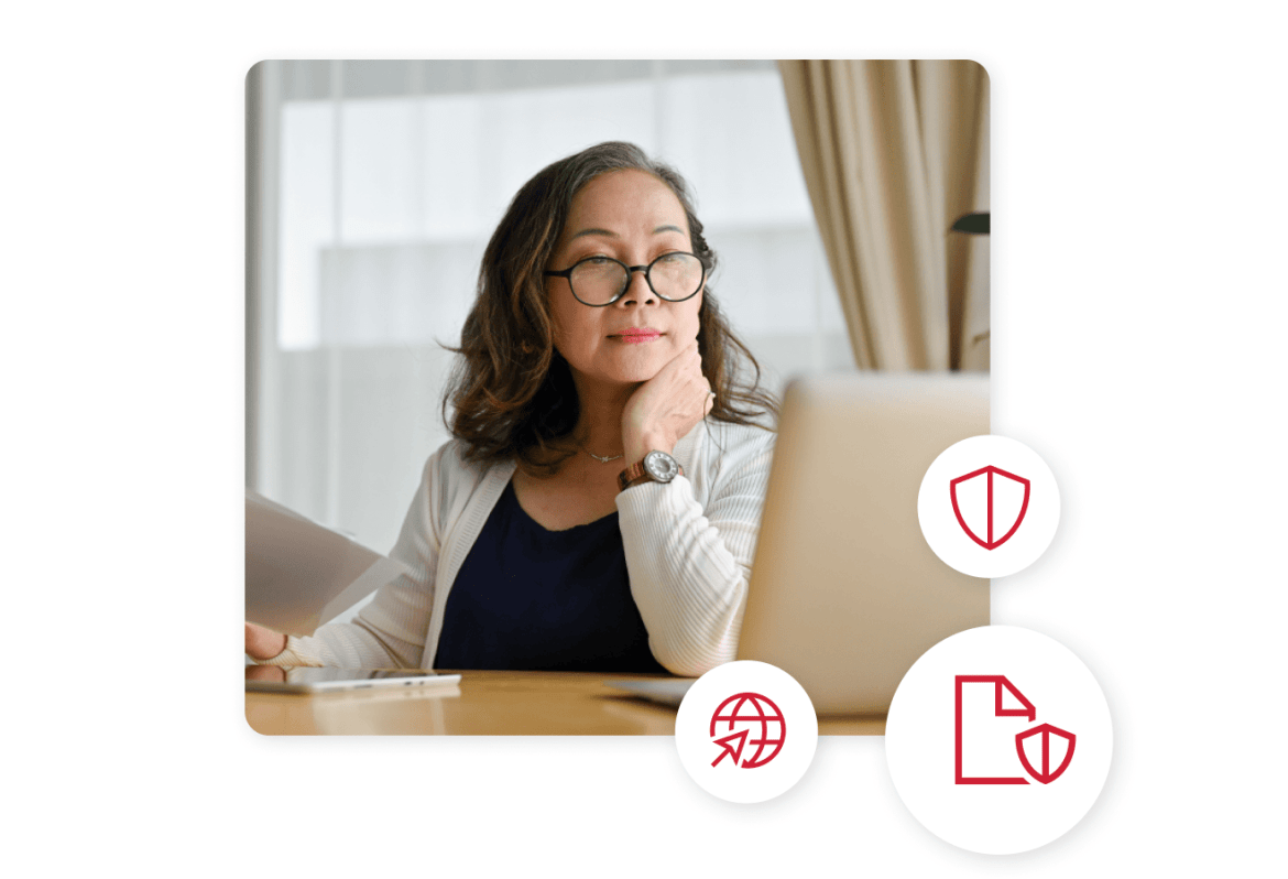 Woman with glasses looking at her laptop with security, browser, and page icons surrounding