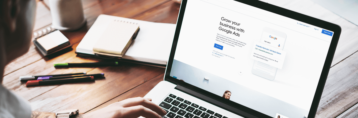 Laptop viewing "grow your business with Google Ads"