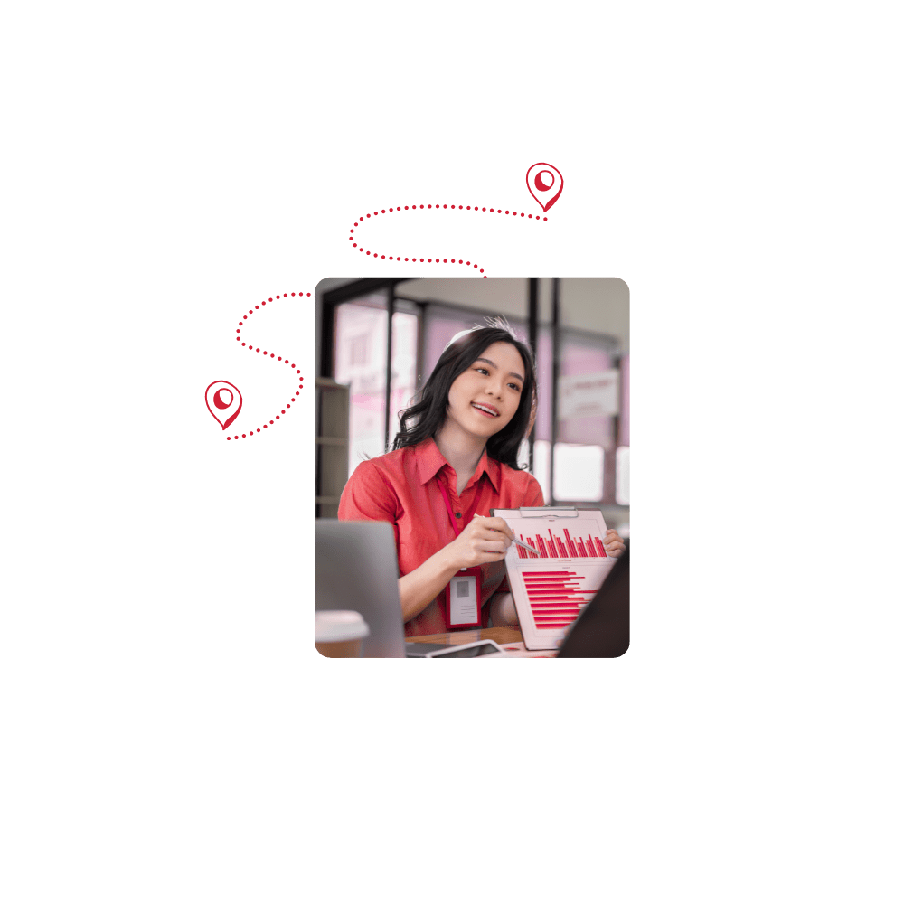 Woman pointing at graph with pen