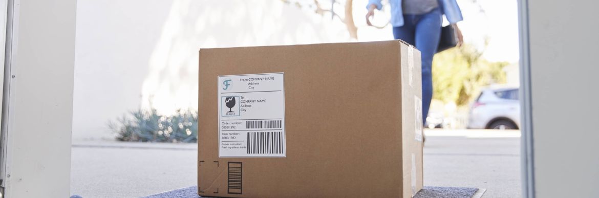 Package delivery on front porch with woman