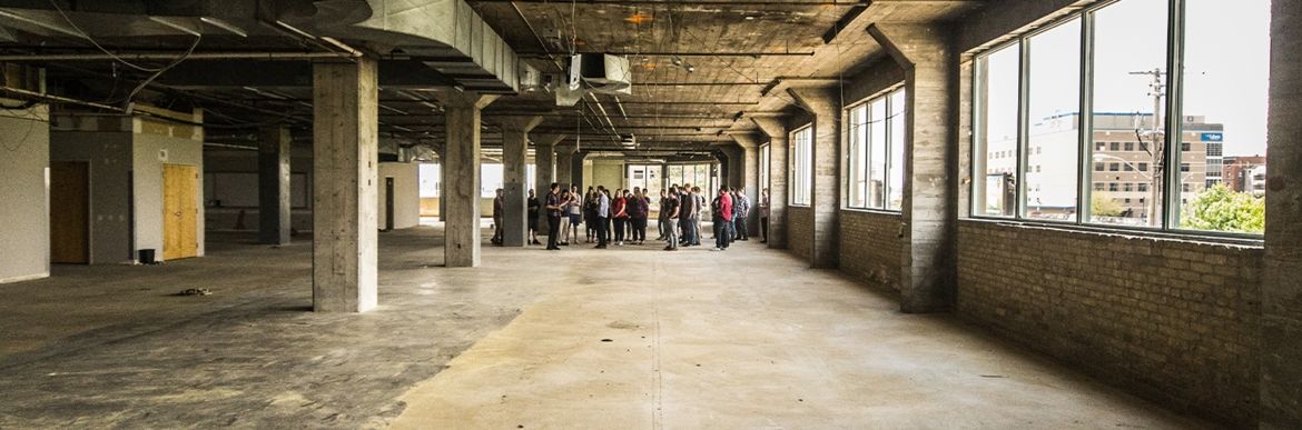 New Northern office, empty cement warehouse space