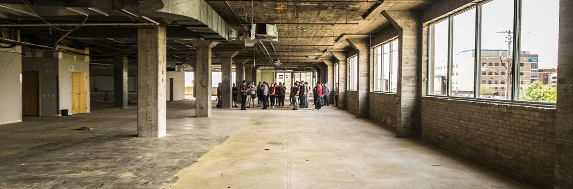 New Northern office, empty cement warehouse space