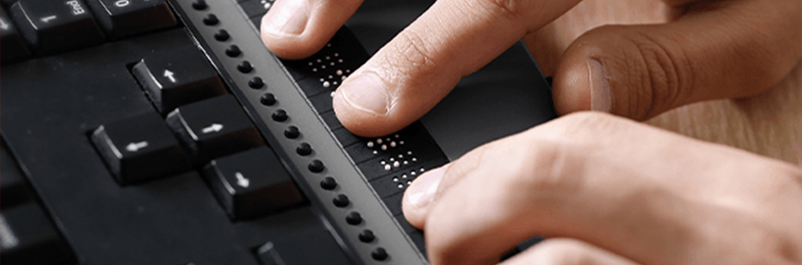Hands typing on keyboard