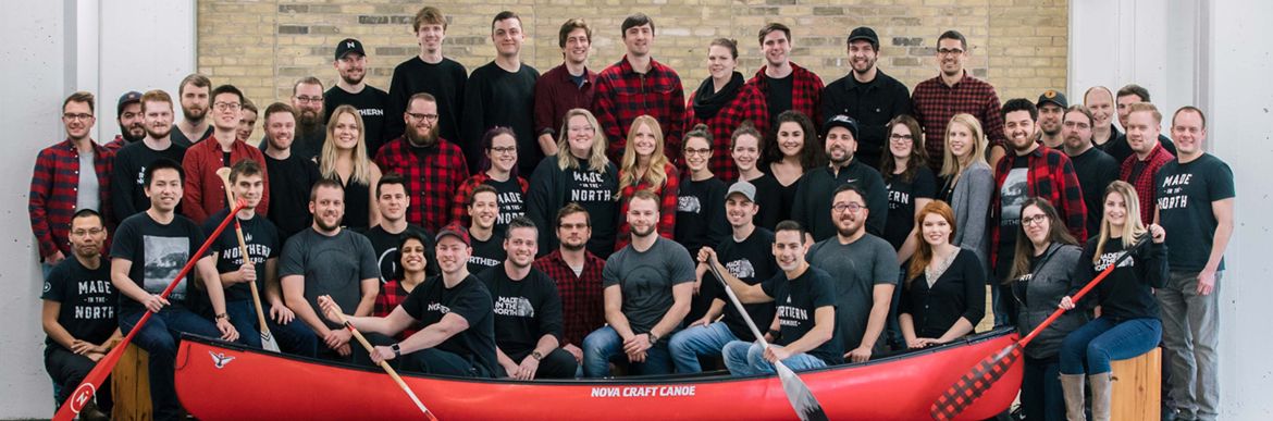 Northern team members with canoe