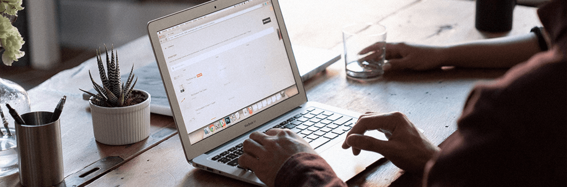 Person typing on laptop