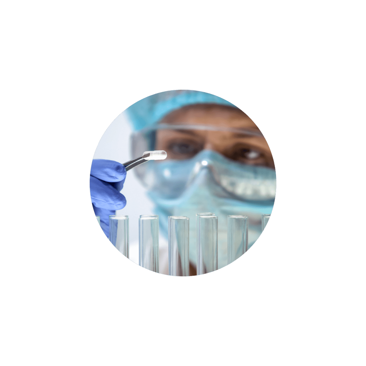 Lab technician examining a pill with tweezers