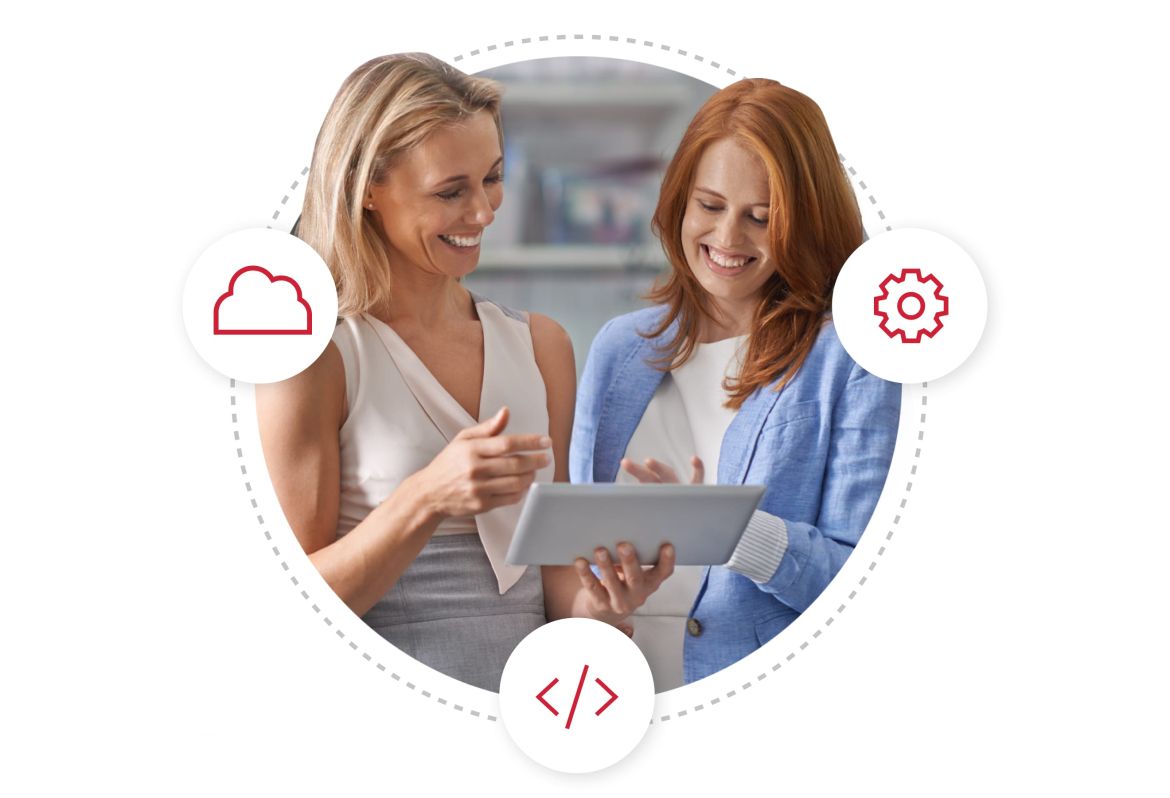 Two women collaborating on a tablet, surrounded by icons of a cloud, gear, and coding