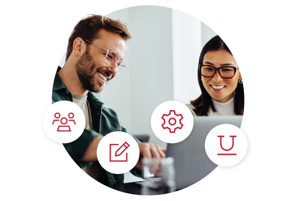 Icons overlaying a two people smiling as they work collaboratively on a laptop