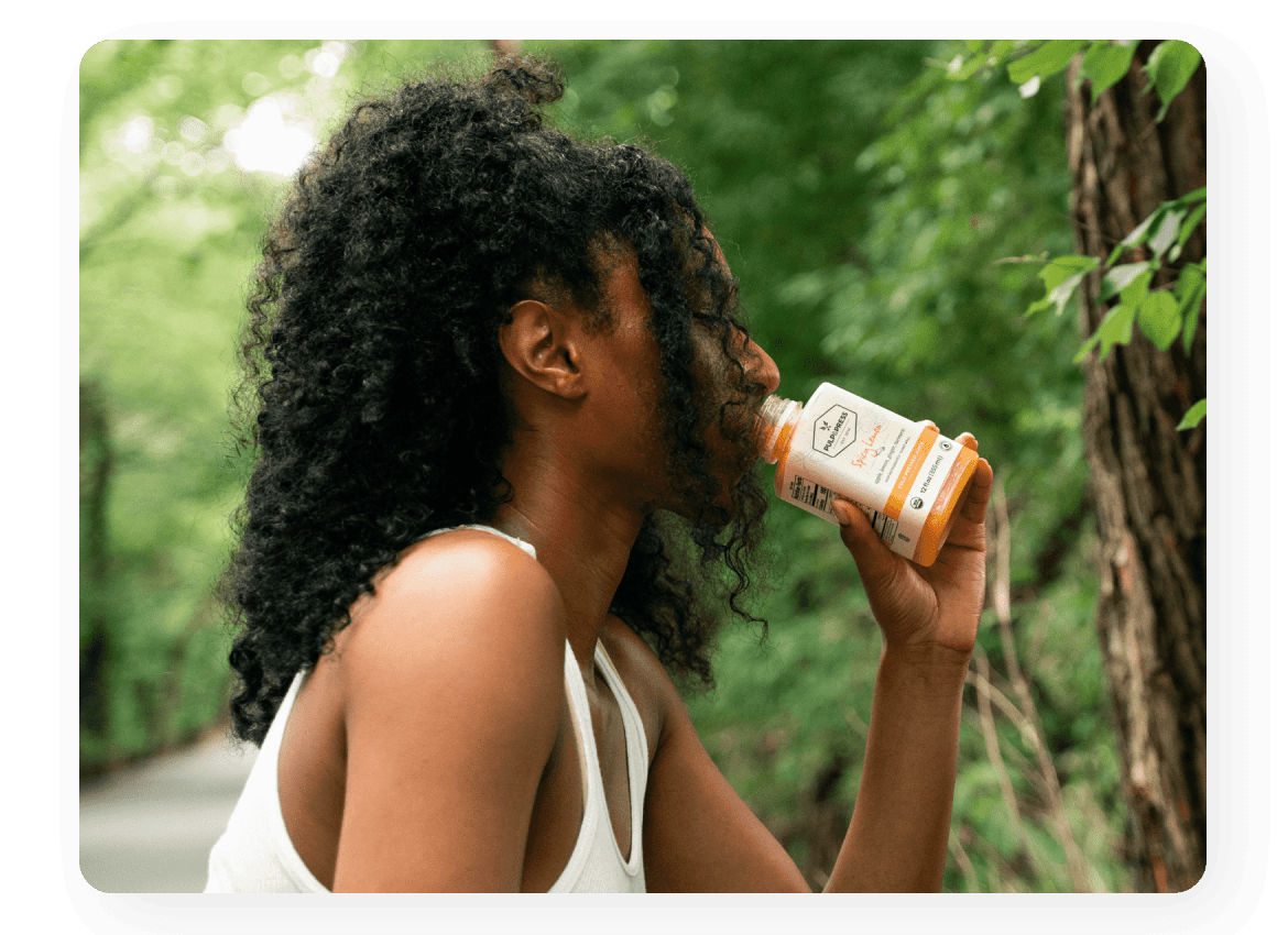Girl drinking Pulp and Press juice