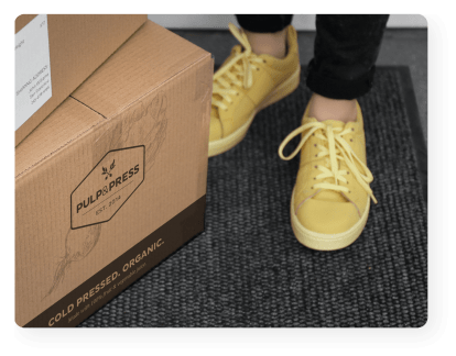 shipment box on a customers doorstep