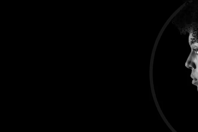 Woman's profile with black background