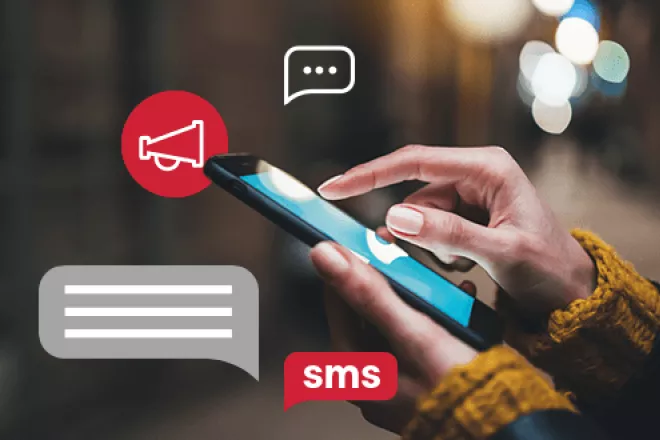 hand on phone with sms and announcement icons