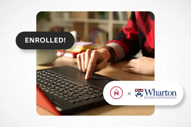 Northern and Wharton partnership logo in-front of hand using trackpad on a laptop.