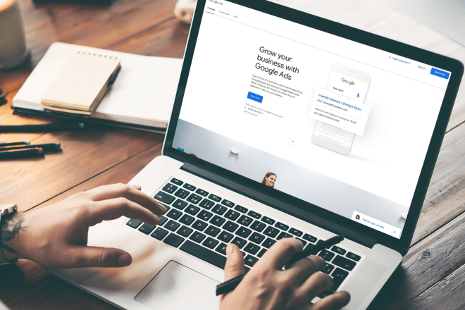 Laptop viewing "grow your business with Google Ads"