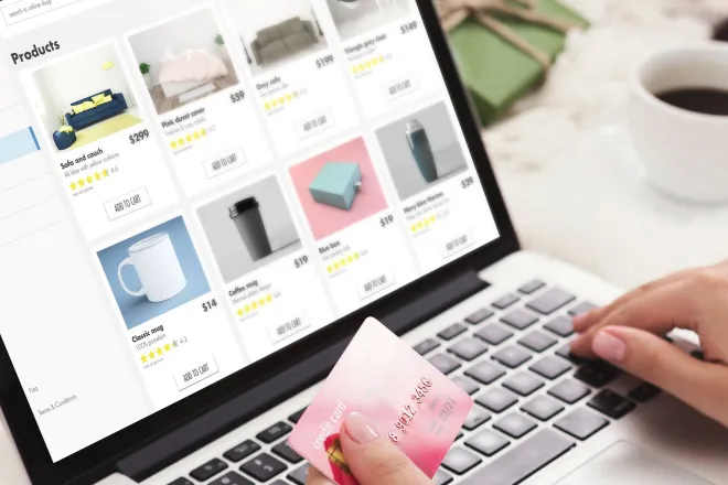 Woman shopping on laptop