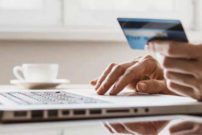 Person paying with credit card