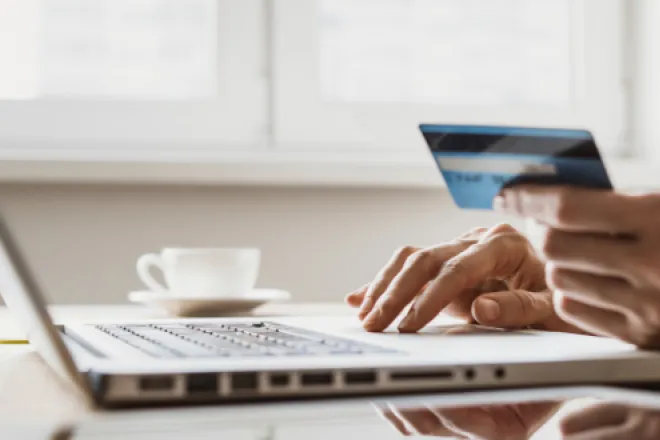 Person paying with credit card