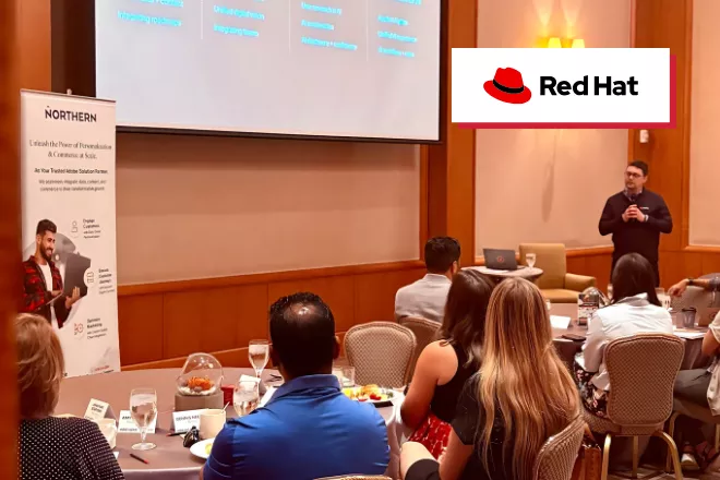 Rob Chappell speaking in front of a crowd at CX Café in Raleigh, NC.