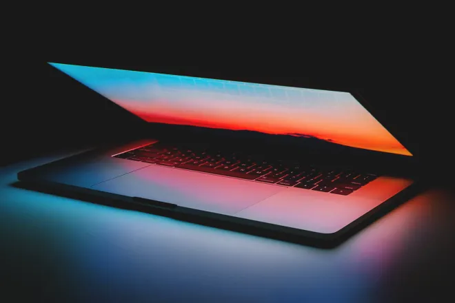 Laptop glowing in the dark