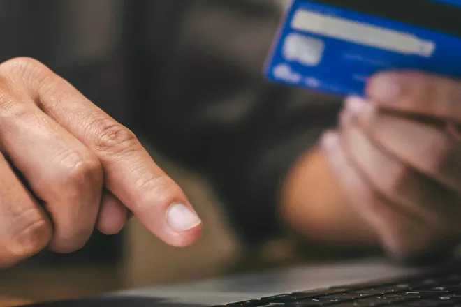 Woman holding credit card