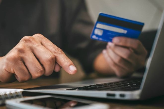 Woman holding credit card