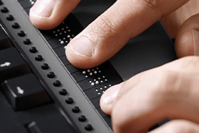 Hands typing on keyboard