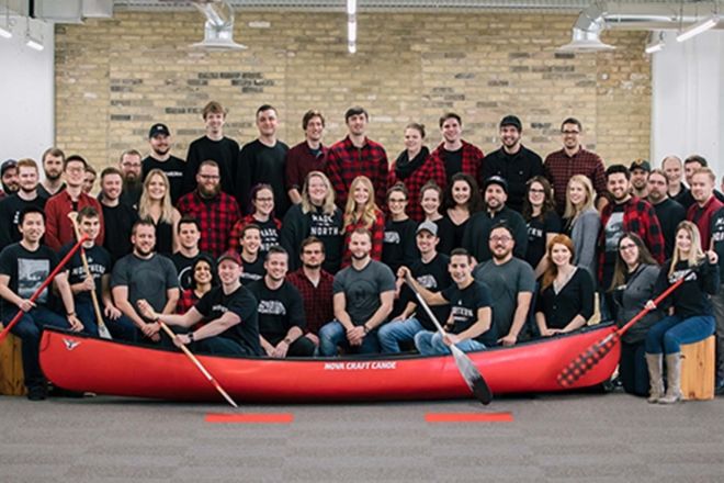 Northern team members with canoe