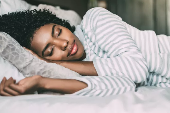 Woman sleeping in bed