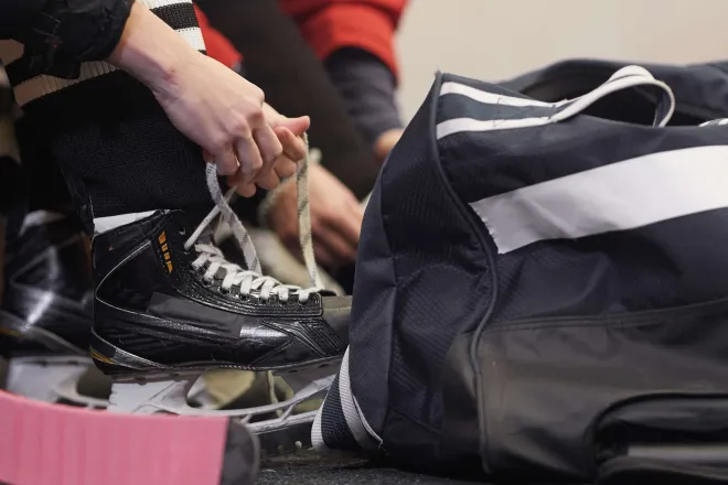 Person tying ice skates