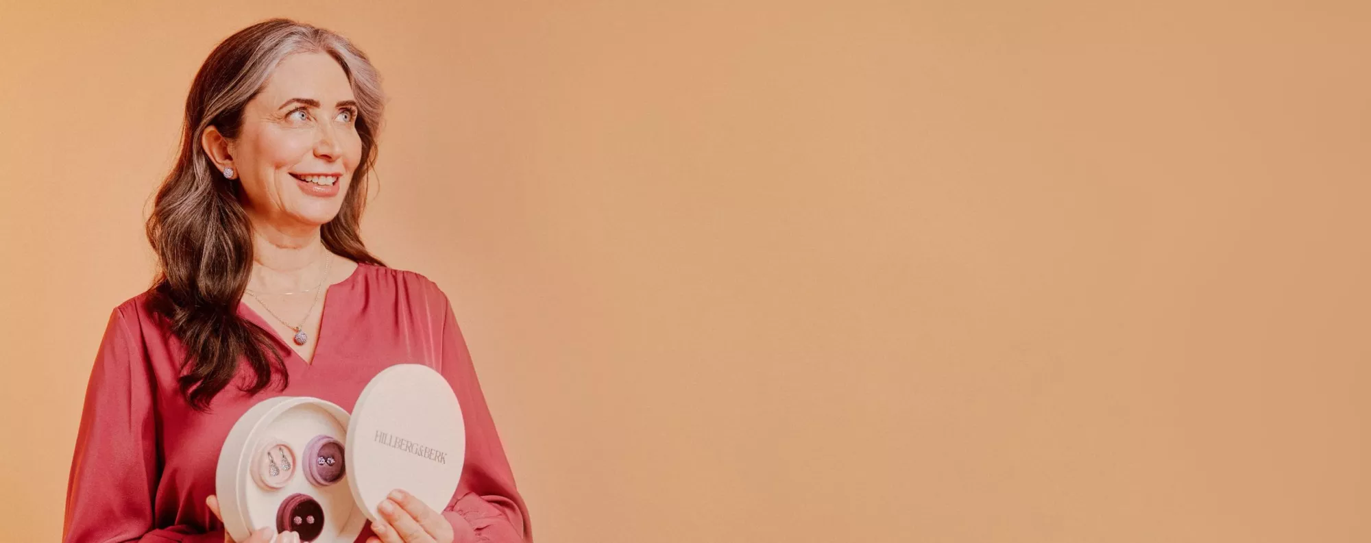 woman holding jewelery box