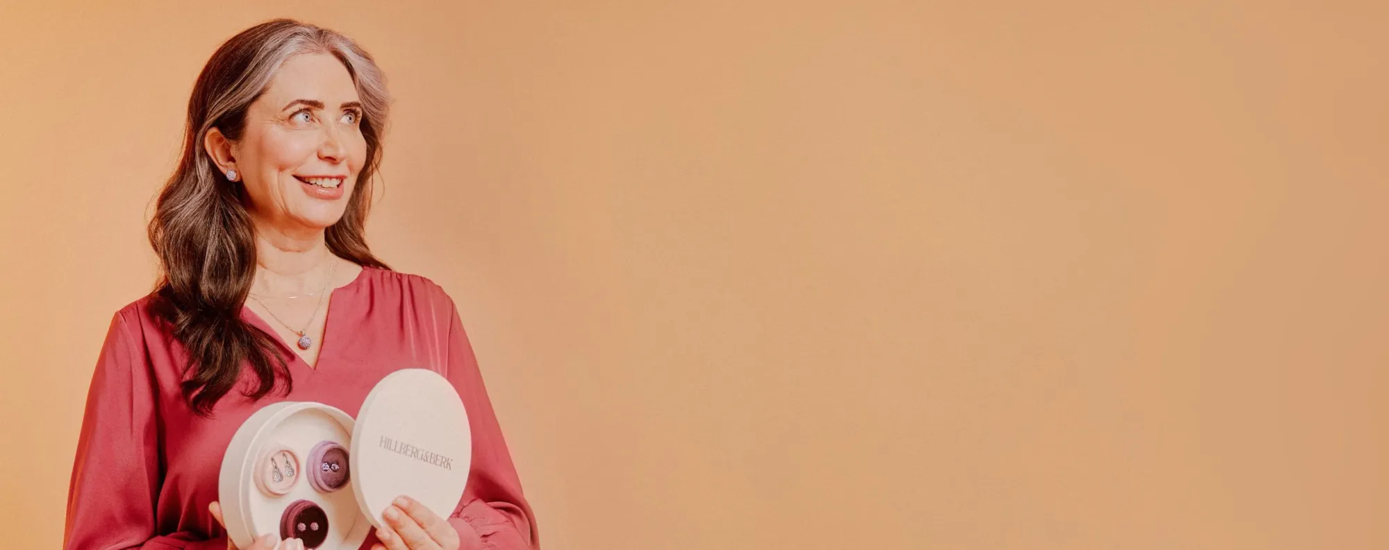 woman holding jewelery box
