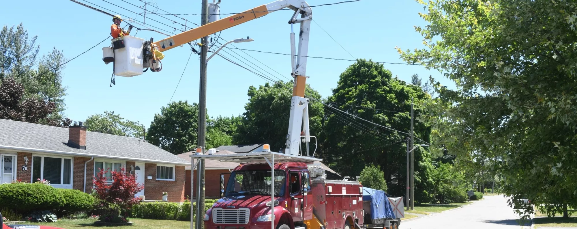 Worker fixing power lines