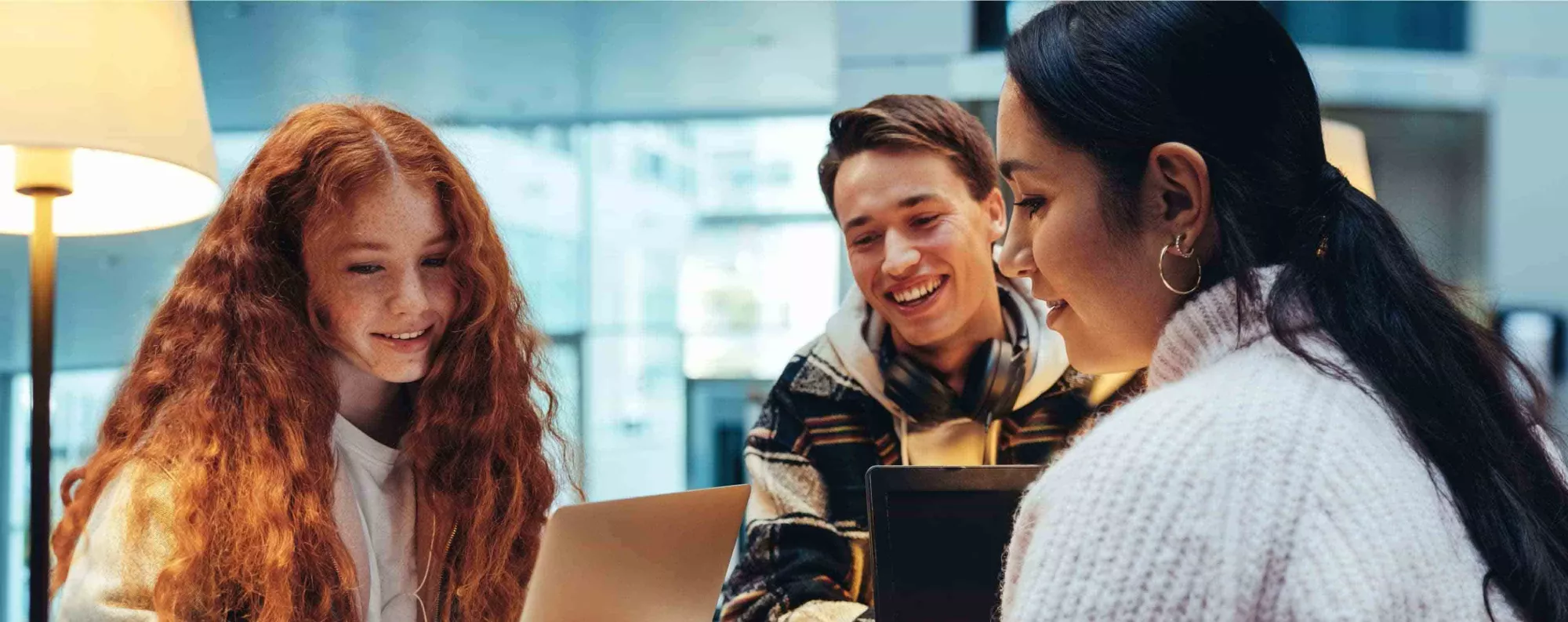 Students working on laptops.