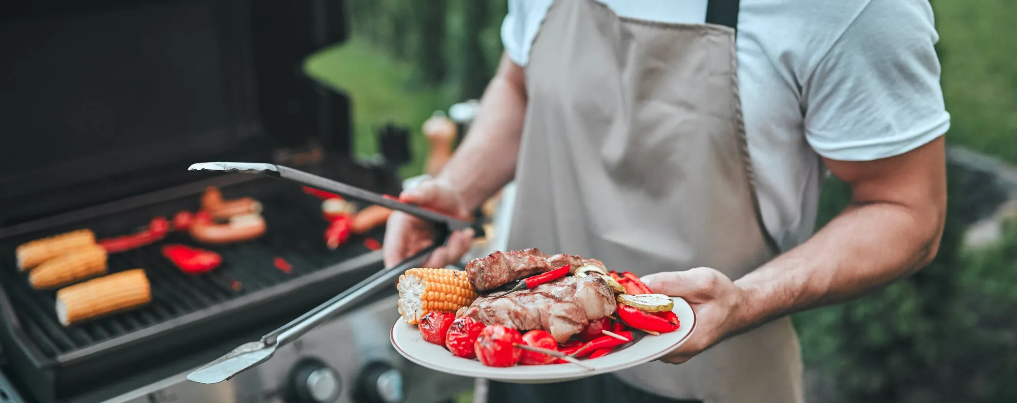 man grilling on a bbq