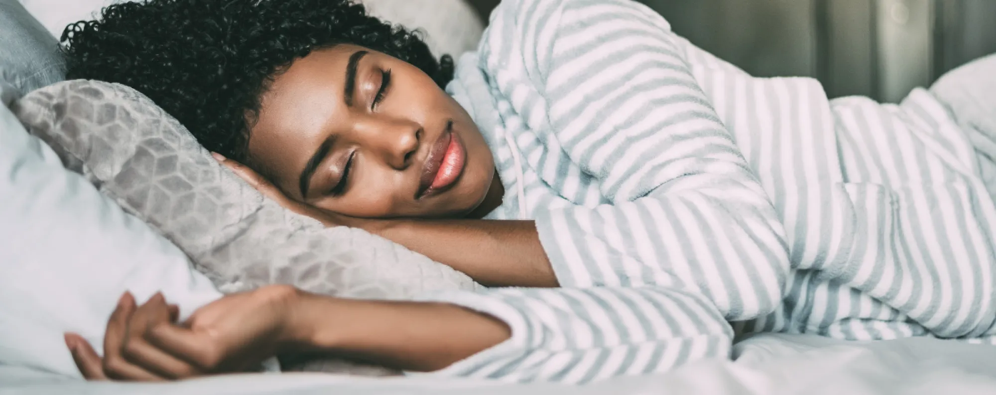 Woman sleeping in bed