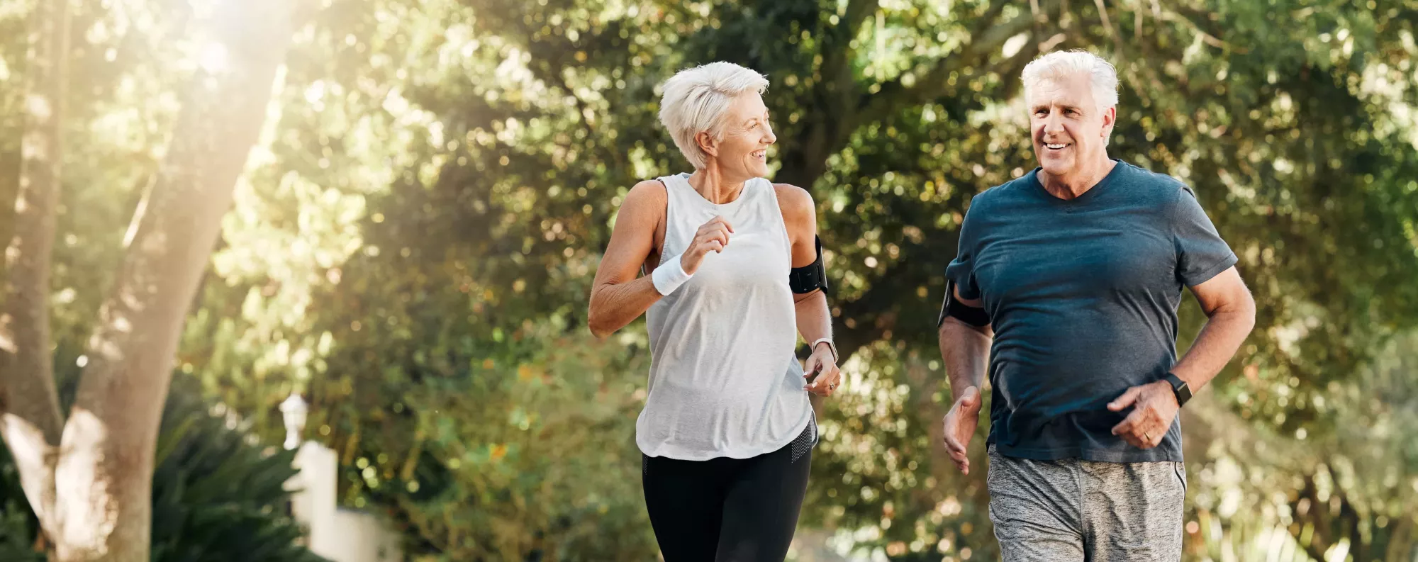 Two people walking in nature.