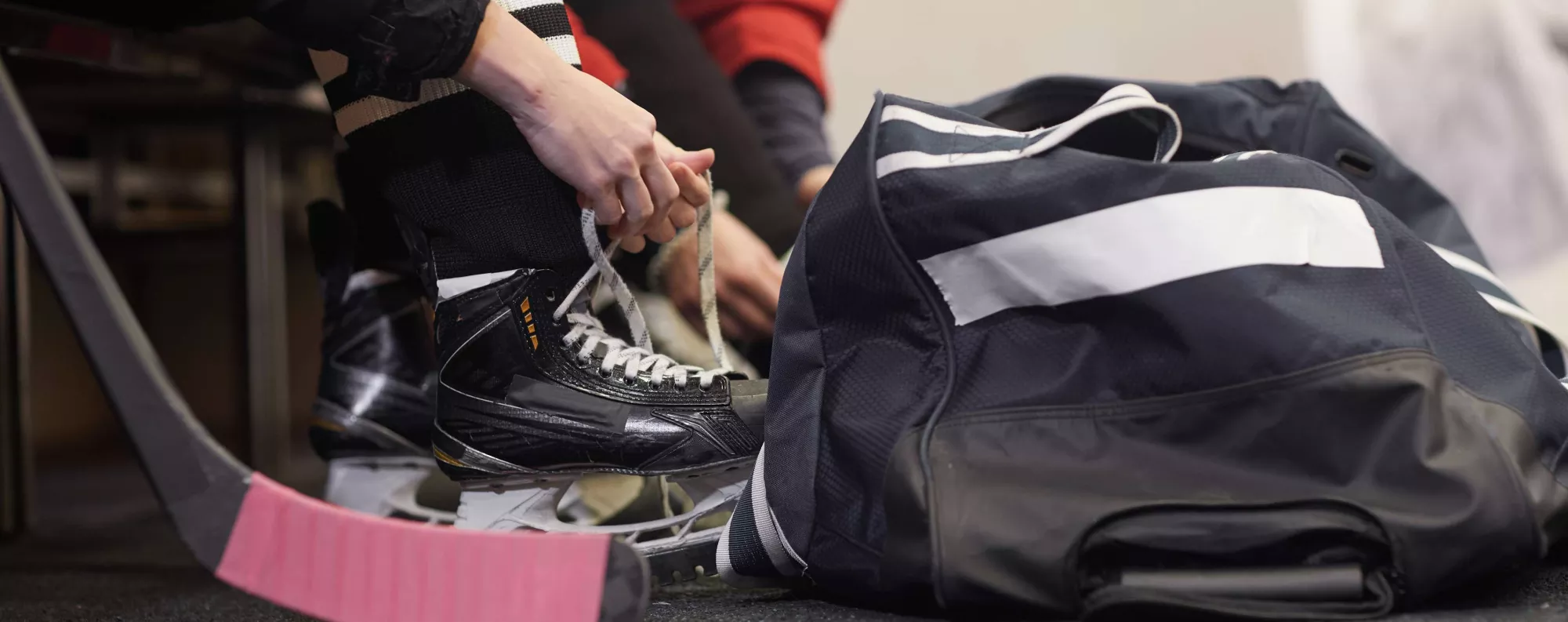 Person tying ice skates