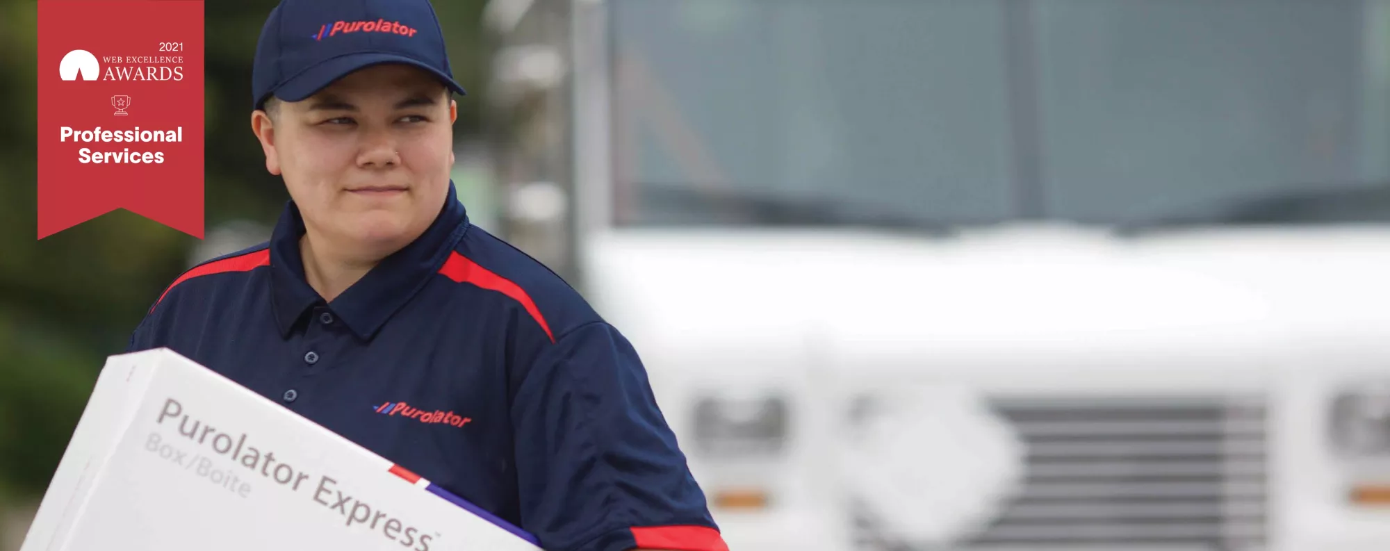 Purolator delivery person delivering a package