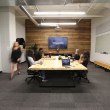 Team meeting in boardroom.