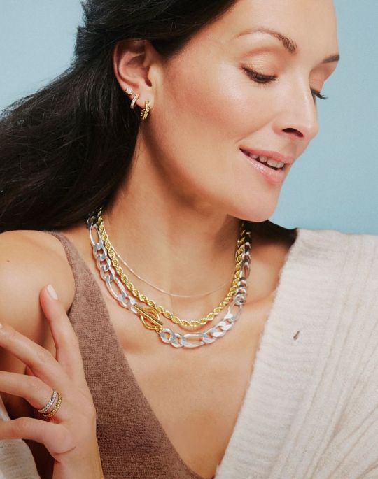 A woman wearing jewelry.