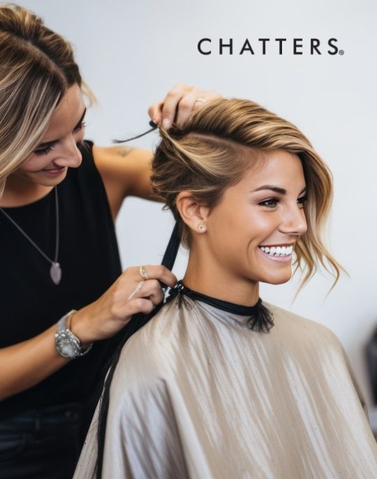 Women getting hair styled with Chatters logo in corner of image